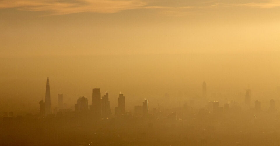 Aerial view South across the city of London in fog and or air pollution